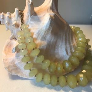 Dual strand necklace. Pale green with gold accents